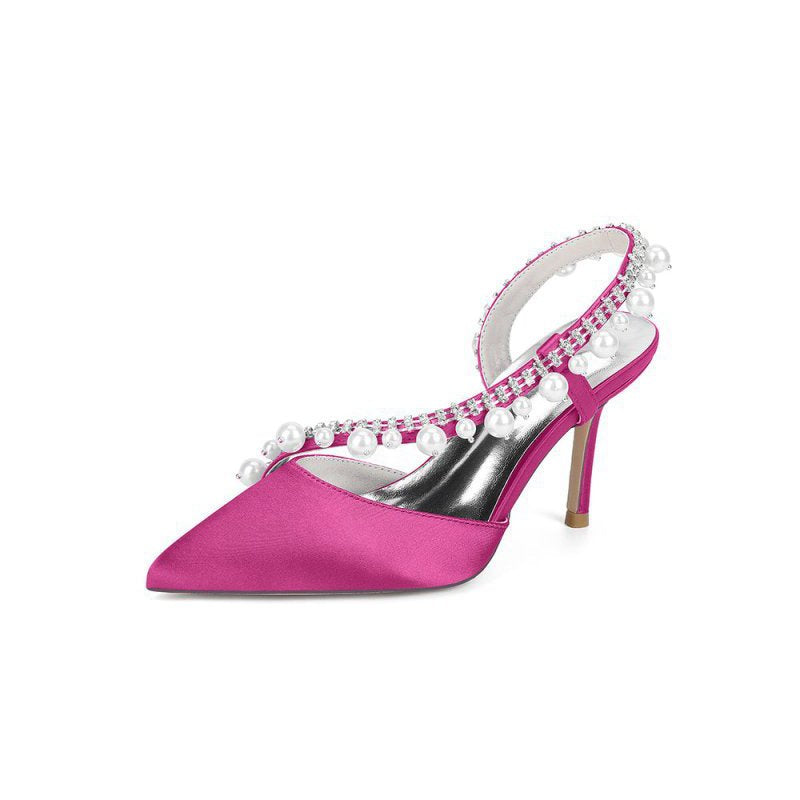 High Heels with Pearl and Crystal Embellishments Description