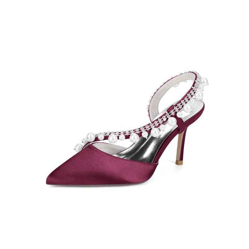High Heels with Pearl and Crystal Embellishments Description