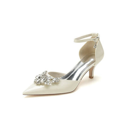 Elegant Patent Leather High Heels with Large Crystal Embellishment