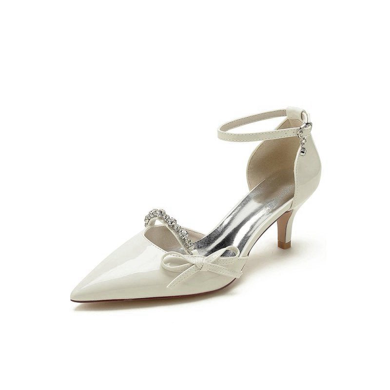 Elegant Stiletto Heel Patent Leather Pumps with Metallic Ornament