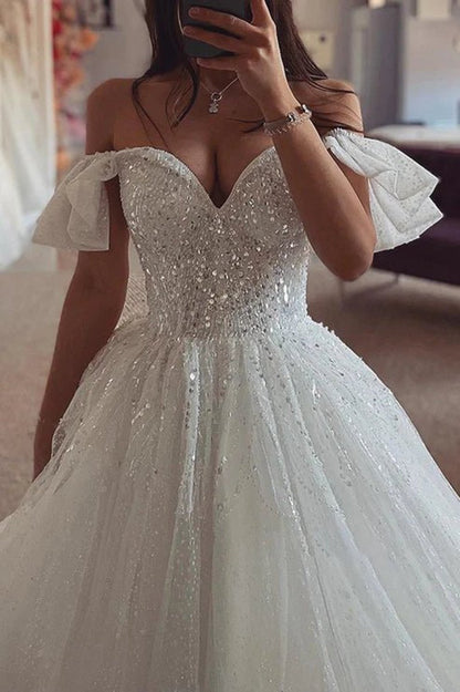 Off-Shoulder Glitter Tulle A-line Sequined Beaded with Train Wedding Dresses